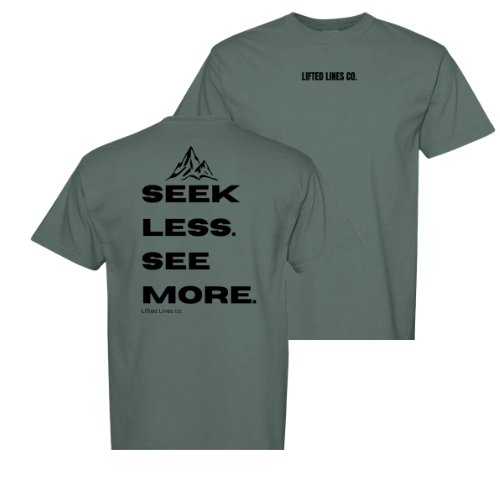 Green t-shirt with 'Seek Less, See More' text on the back, brand 'Lifted Lines Co.' visible.