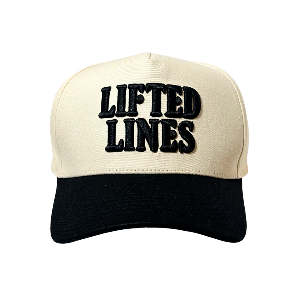 Beige and black cap with 'LIFTED LINES' text on a white background